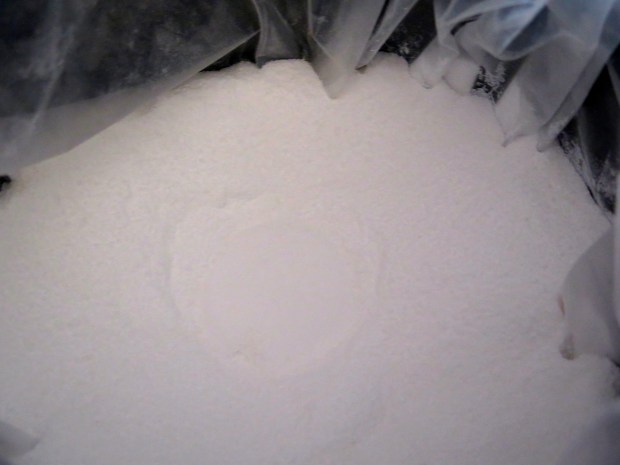 Adding salt mix, one cup at a time.