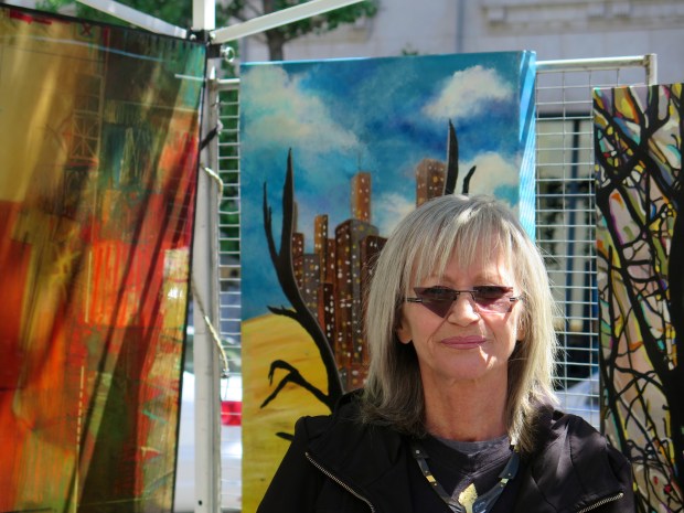 Art Child purchased a small print of this powerful mixed media painting. The original has volcanic ash in the tree limbs. 